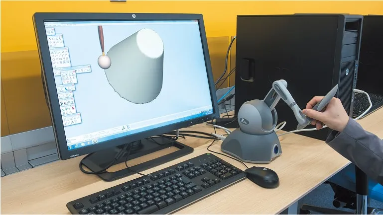 3次元力覚入出力デバイスを使用している様子