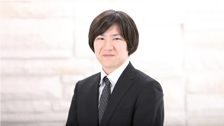 栗山 貴嗣 先生の写真