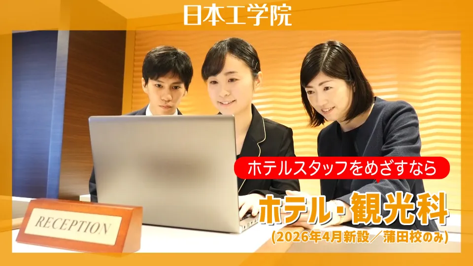 屋外で笑顔で話す柳 恒さん