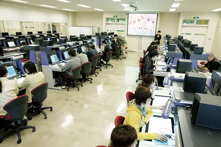 デスクライトまで完備した実用的なデスクに向かう真剣な生徒達の風景