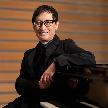 笑顔で話す武部聡志先生