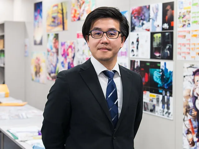 岡本さんの講師、奈良篤男のポートレート