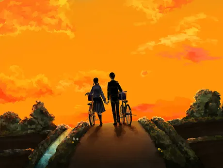 夕焼けの道を帰る