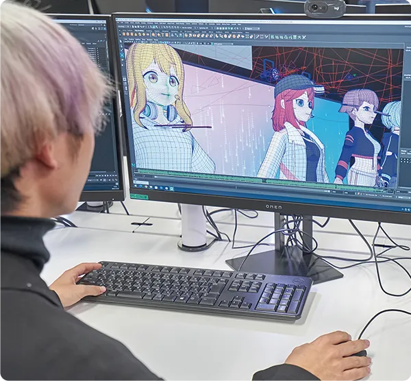学生が３Dキャラクターのアニメーションを制作している様子